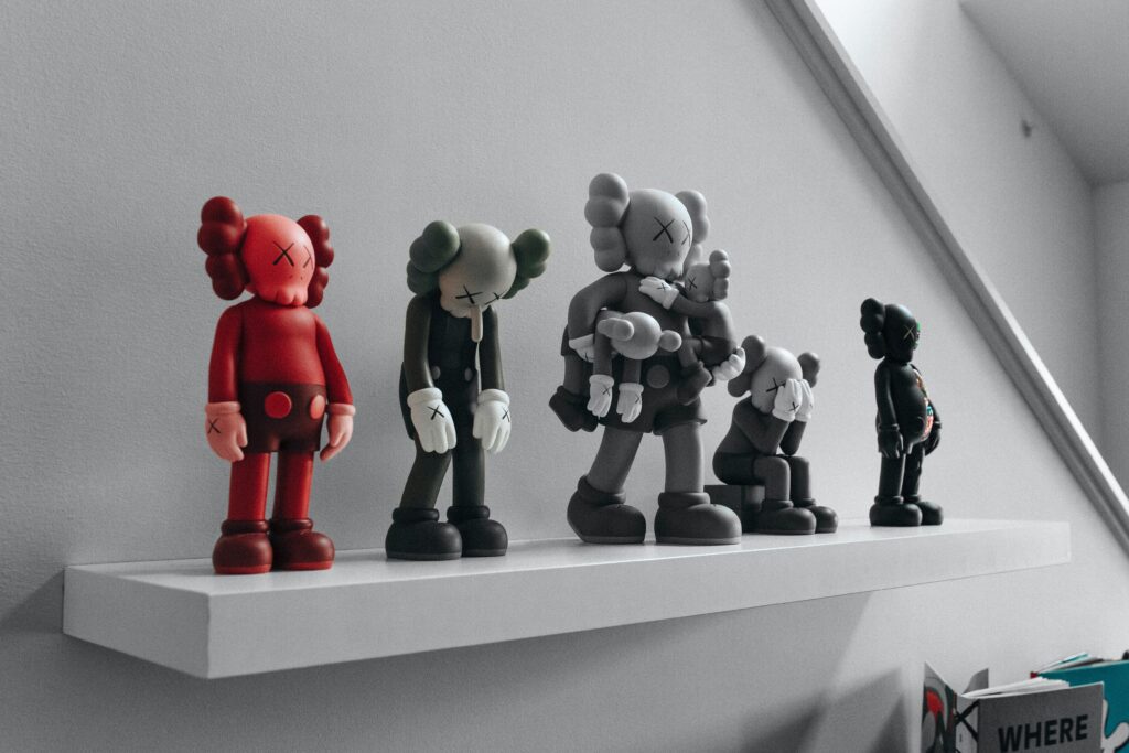 Photo by Matthew Hamilton on Unsplash KAWS Figures created by Brian Donnelly, ex-Disney Illustrator, also known as KAWS